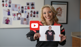 woman that has lost weight showing a photo of her past self